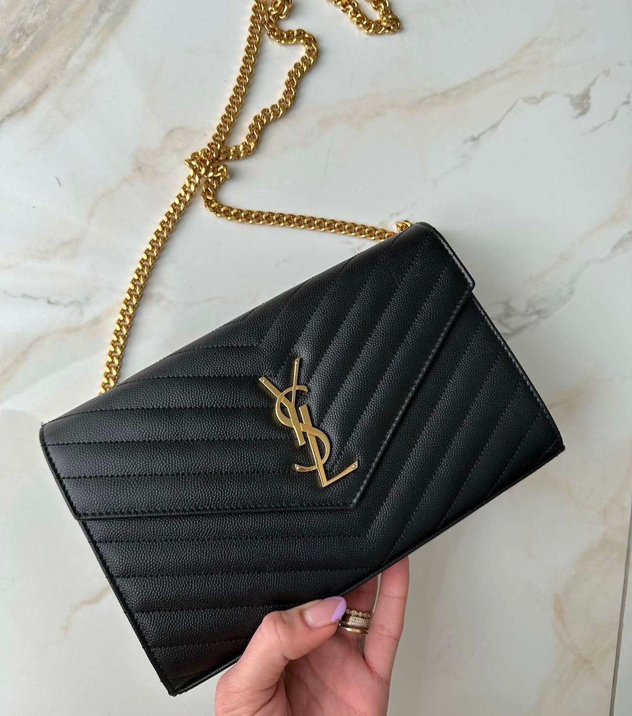 Pochette Saint La*rent