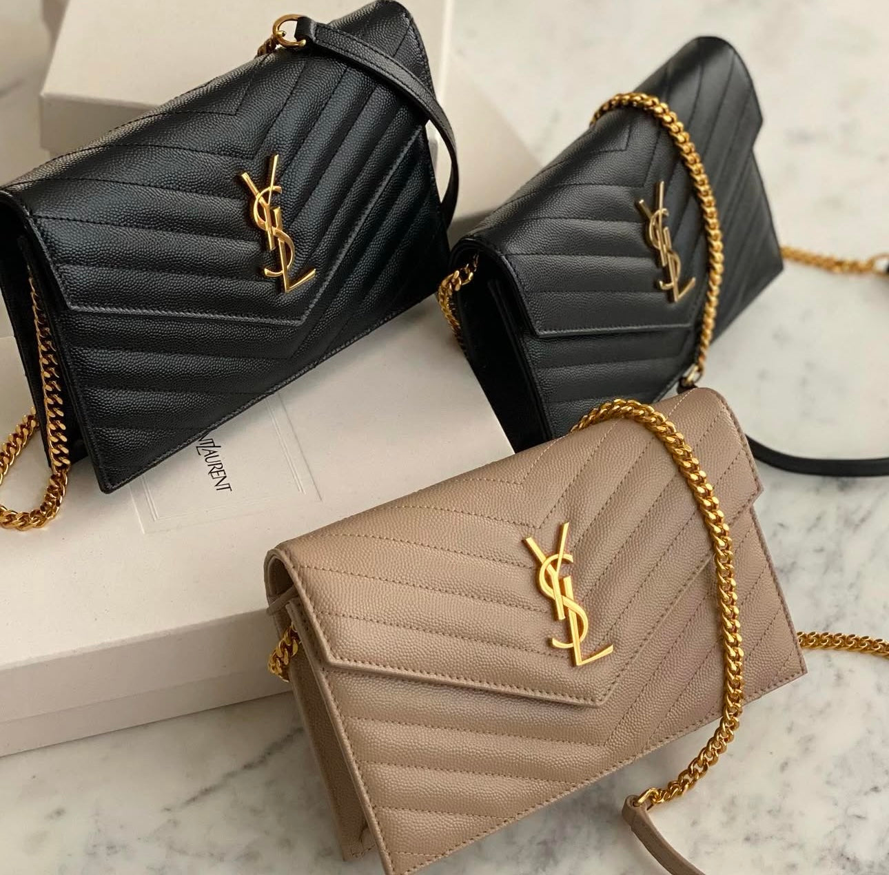 Pochette Saint La*rent
